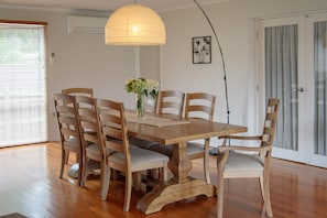 Large 8–10-seater timber dining table 