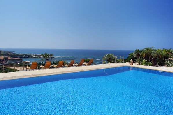 Enjoy the view of the famous Sea Caves from your own private terrace.
