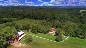 Aerial view of the farmhouse and barn