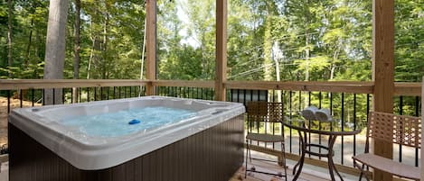 Relax in the secluded and private hot tub on the back deck.