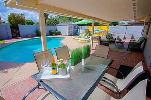 Coffee and/or mimosas by the heated private pool? No neighbors in the back!