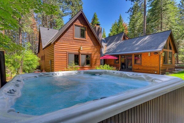 Exterior Back with Hot Tub