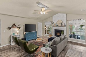 Cozy up in a space where warmth and comfort meet sophistication