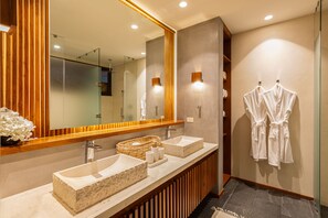 large double sink bathroom.
white robes.
