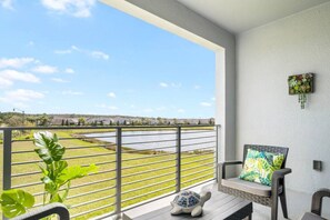 Balcony with lake view!#Disney #Parks #StoreyLake #Apartment #Vacation #Rental #Kissimmee #Orlando