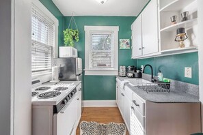Stove, fridge, microwave and coffee station
