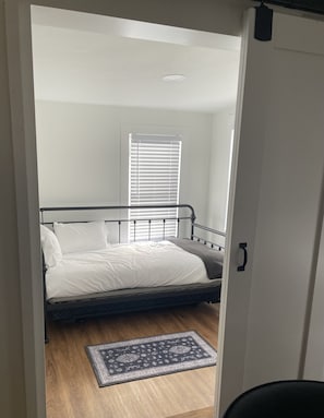 Small bedroom with twin bed + trundle. 