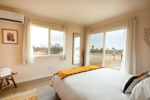 Wake up in the cozy primary bedroom to the desert views