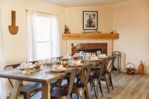 Dinner setup at our long indoor dining table. Perfect for family or friend gatherings. 