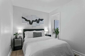 Second bedroom with a plush mattress and crisp sheets. :)