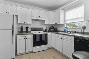 Cook up a storm in our kitchen! Fridge, Oven, Microwave and Dishwasher! Full spice rack, keurig, toaster and more!