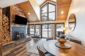 Open concept living room with golf course views.