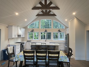 Kitchen areas with fridge, stove, D/W and other appliances