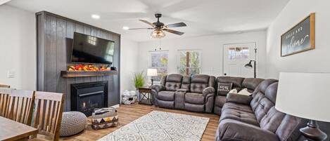 Gather your group in the open concept living room with gas fireplace