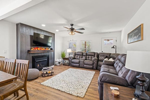 Gather your group in the open concept living room with gas fireplace