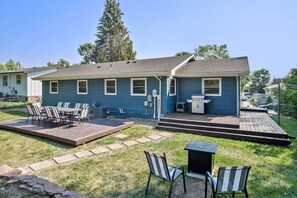 Outside View with large table and propane fire table to enjoy with you family