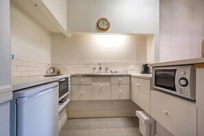 Small kitchen with full kitchenette facilities