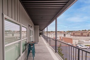 Big shared balcony outside your door where you can sip a coffee or check the weather