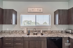 A fully-equipped kitchen for preparing meals at home