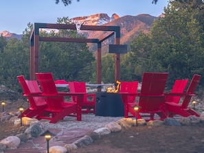 Enjoy out newly built (2024) luxury 10 person firepit with a Stargazing Pergola