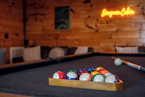 Pool table and cozy seating arrangement in the family room—ideal for evenings of fun and relaxation
