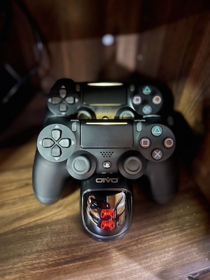 Detail of the gaming area with a PlayStation 4 setup, inviting you to bring your favorite games. Please bring your own game CD.
