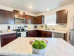 Large kitchen with plenty of cabinet space for anything you buy! Plates, cups and silverware for adults and children of all ages! Plenty of plans for you to cook anything you want. I made sure to buy anything you may need to cook a homemade meal. 
