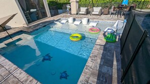 Pool area showing owners Lanai area.