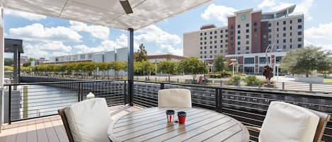 Second floor patio overlooking the Downtown Wilmington Riverwalk