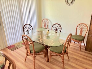 This bright, roomy dining space can seat six.
