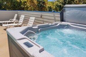 Unwind in the bubbly Hot Tub after a day exploring.
