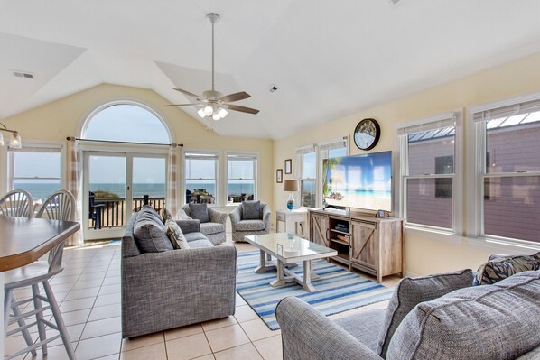 Enjoy time together as a family in the beautifully tiled Living Area with a large Flat Screen TV and stunning views of the ocean.