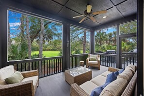 Screened porch with golf views