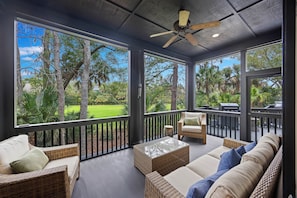 Screened porch with golf views