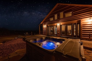 Gaze at the Milky Way while indulging in a relaxing soak in the hot tub.