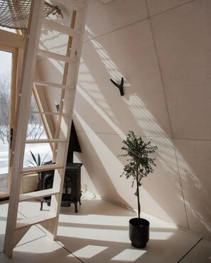 Big windows make for a lovely light filled space w/ seasonal Lake Superior views