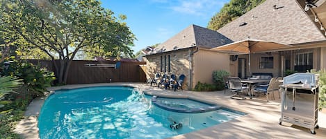 Enjoy heated pool with outdoor dining and BBQ