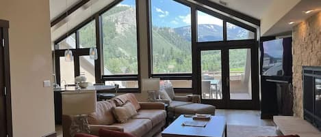 Main living room with breathtaking views of Beaver Creek and the Eagle River. 