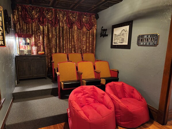 Enjoy a one of a kind popcorn movie night in the vintage theater room!