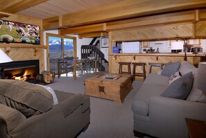 Living room w/fireplace, large TV