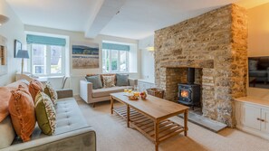 Contemporary style meets classic touches in Christmas Cottage's sitting room