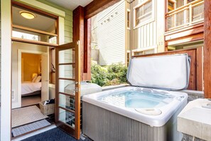 PRIVATE 8 person Hot Tub just off of the downstairs bedroom on your secluded patio on the corner. Enjoy a soak after a long day on the mountain! "We loved having the hot-tub just outside the lower level."-Larry, Lansing, MI