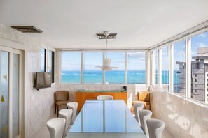 The kitchen area boasts a large dining room for 8-10  guests with oceanview.