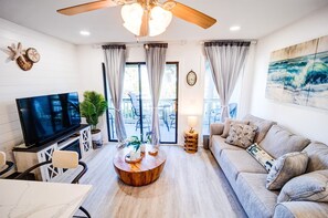 Living space with a nice view of the ocean in the distance