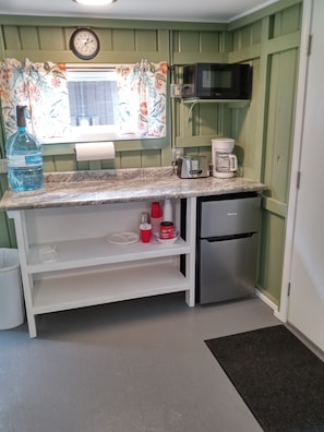 Kitchenette.  Small refrigerator/freezer, microwave, coffee maker and toaster