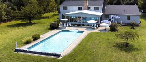 In-ground  pool...and private back yard on Solitude Creek with private pier