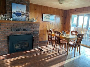 Inside dining area and gas fireplace