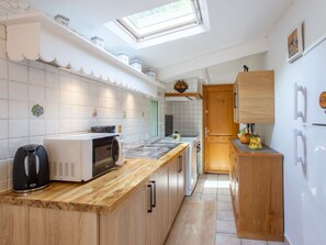 Cabinetry, Furniture, Countertop, Kitchen, Wood, Kitchen Appliance, Home Appliance, Interior Design, Flooring, Floor