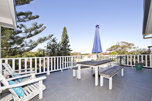 Deck with BBQ and outdoor furniture to enjoy outdoor dining or to just sit back.