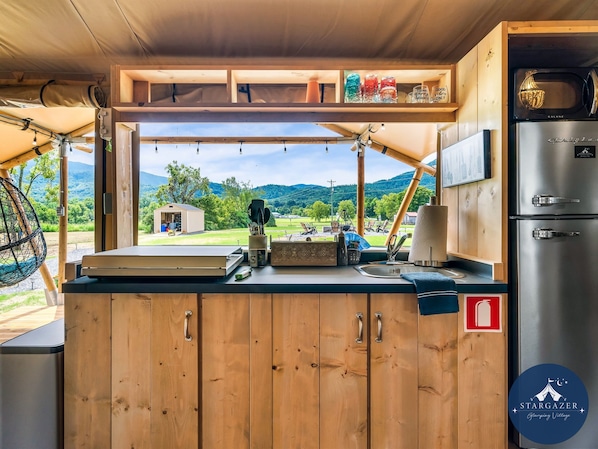Pass through bar brings the outdoors in with an amazing view!
